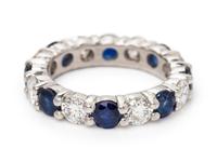 A Platinum, Diamond and Sapphire Eternity Band,