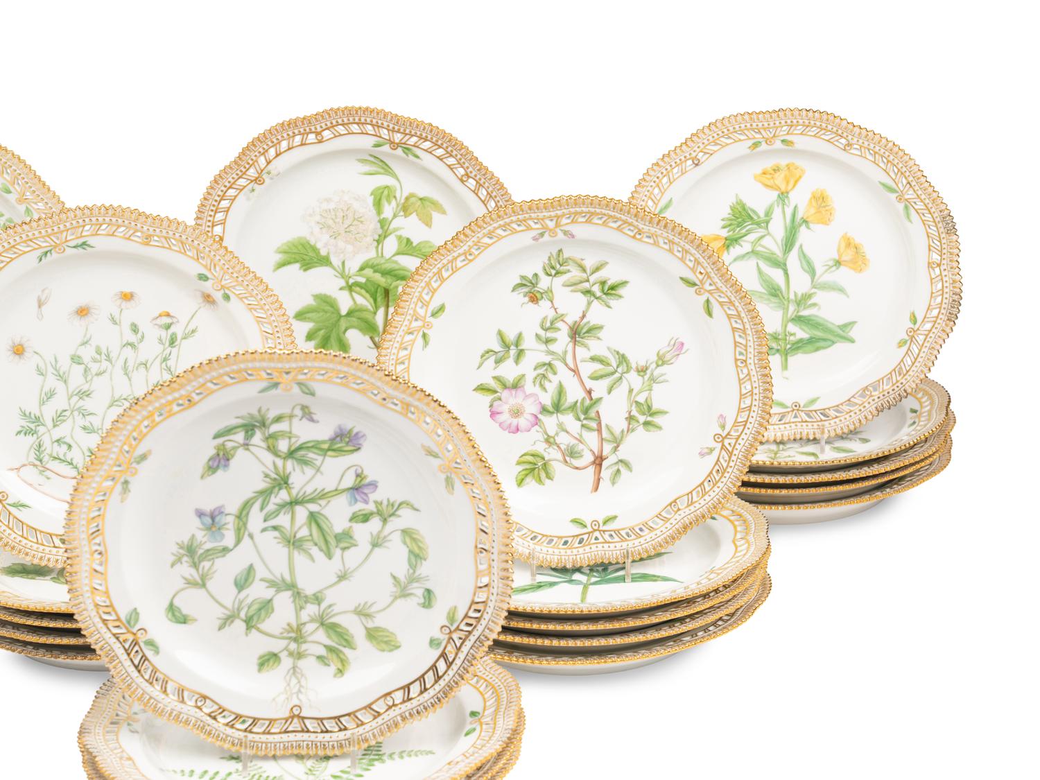A Set of Twenty-Nine Royal Copenhagen Flora Danica Reticulated Porcelain Dinner Plates