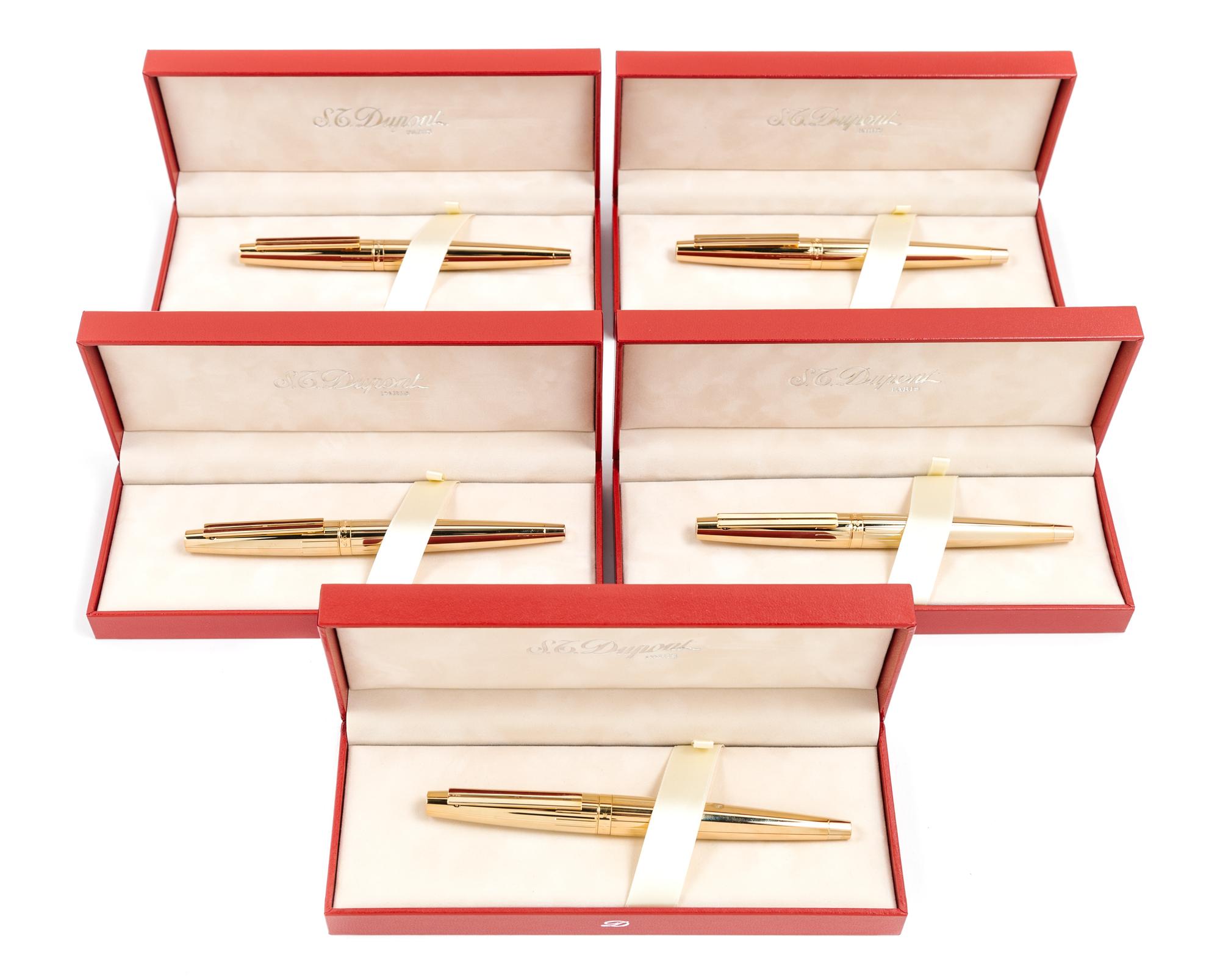 A Group of Five S.T. Dupont Gold-Plated Ellipsis Fountain Pens