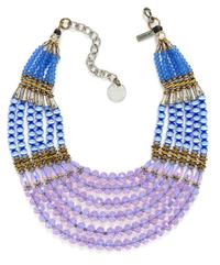 A Masha Archer Lavender and Blue Glass Bead Six Strand Collar Necklace, 15.5" - 19" L; 3" W.