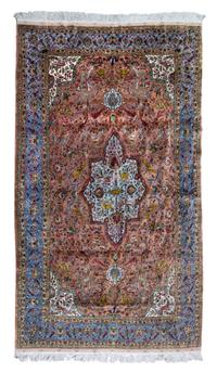 A Persian Silk and Wool Rug 8 feet 9 inches x 5 feet 8 inches.