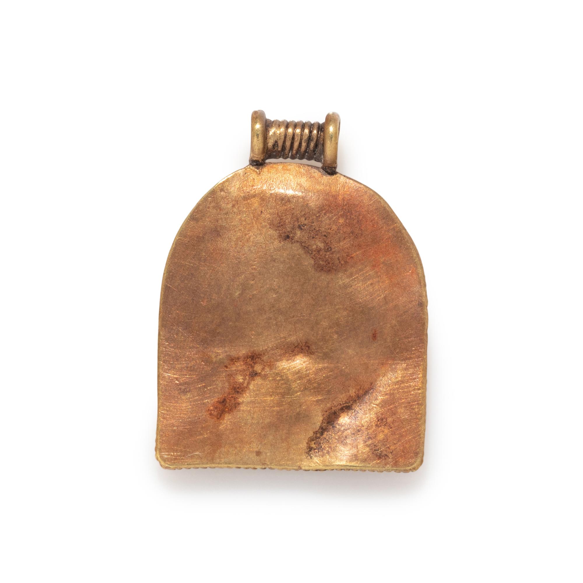 A Phoenician Gold Pendant with Two Uraei