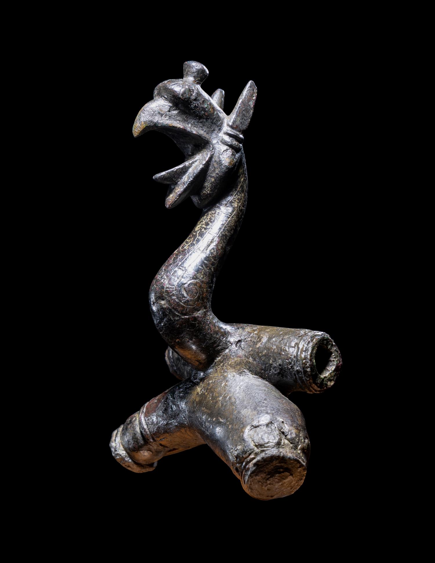 An East Greek Bronze Griffin Protome
