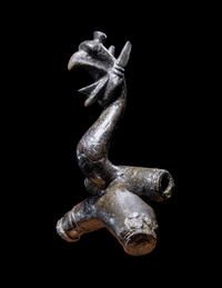 An East Greek Bronze Griffin Protome