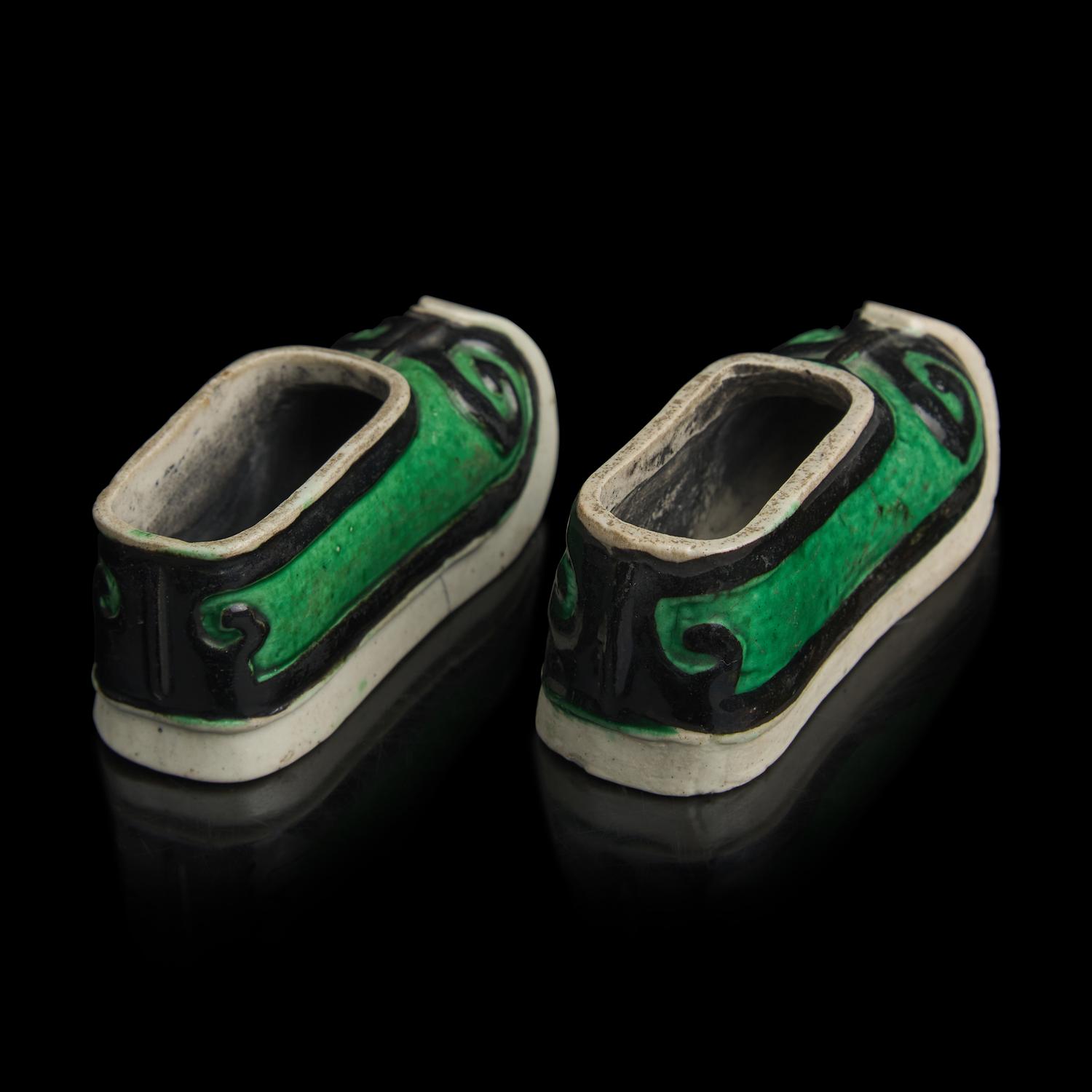 A Pair of Chinese Famille Verte Glazed Biscuit Porcelain "Shoes", 18th Century 清中期 素三彩雕瓷鞋模型一對