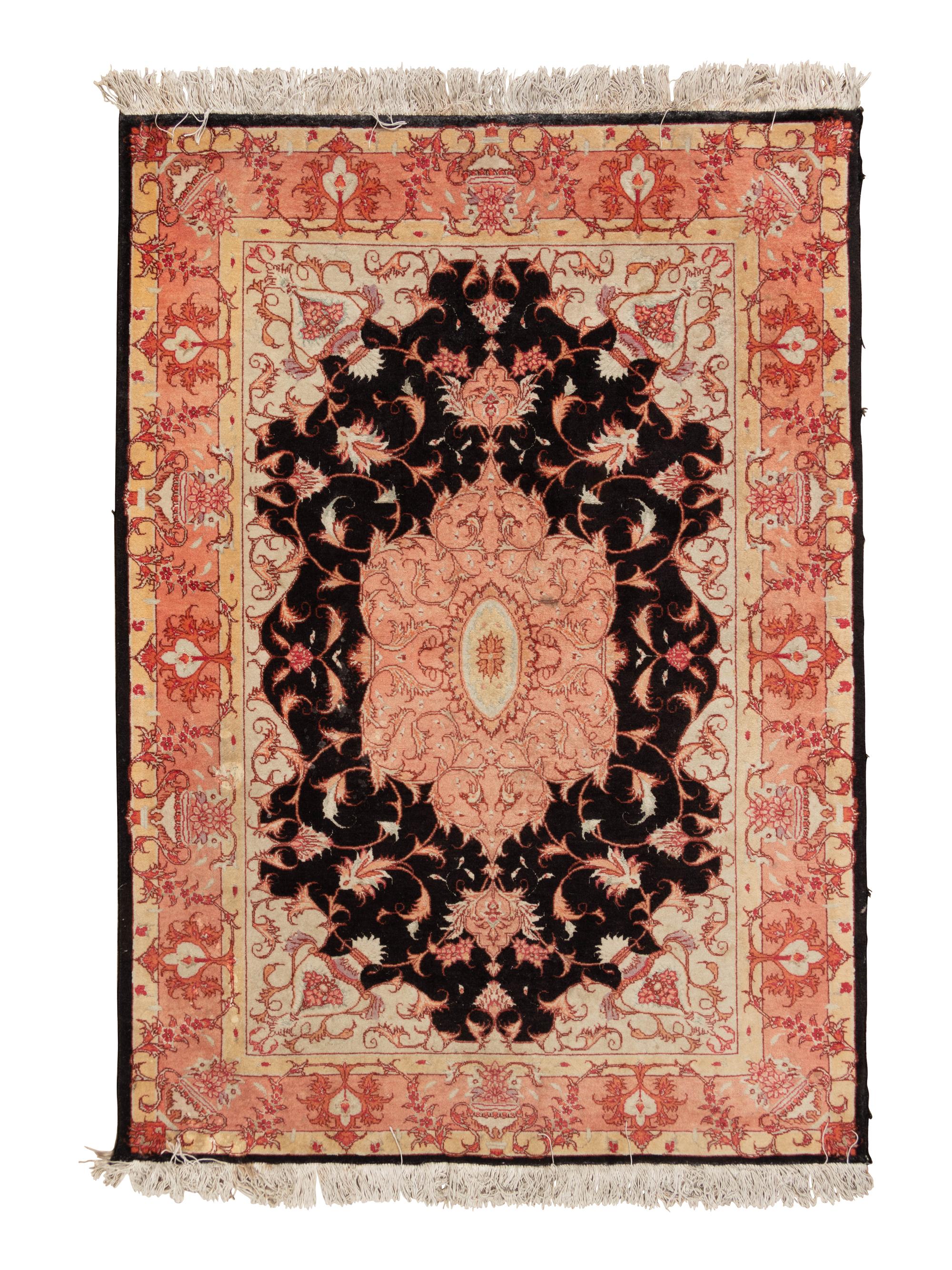 A Tabriz Wool Rug
