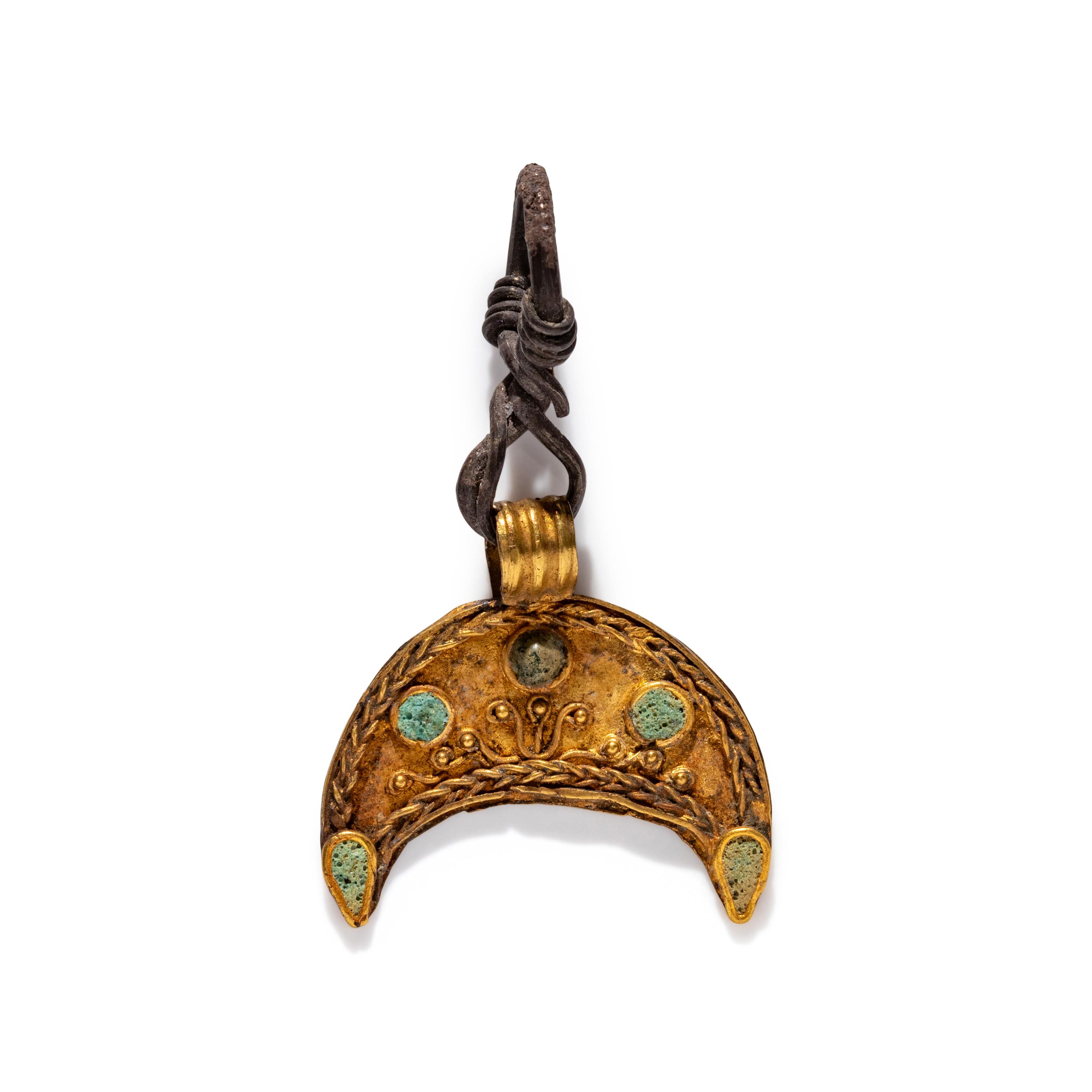 A Hellenistic Gold and Glass Crescent-Shaped Pendant