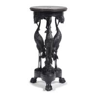 A Rare Aesthetic Movement Carved and Ebonized Wood Plant Stand