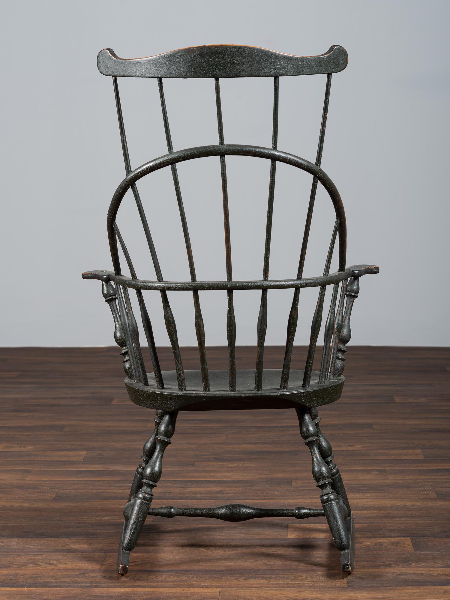 A Green-Painted Sack and Comb-Back Windsor Rocker