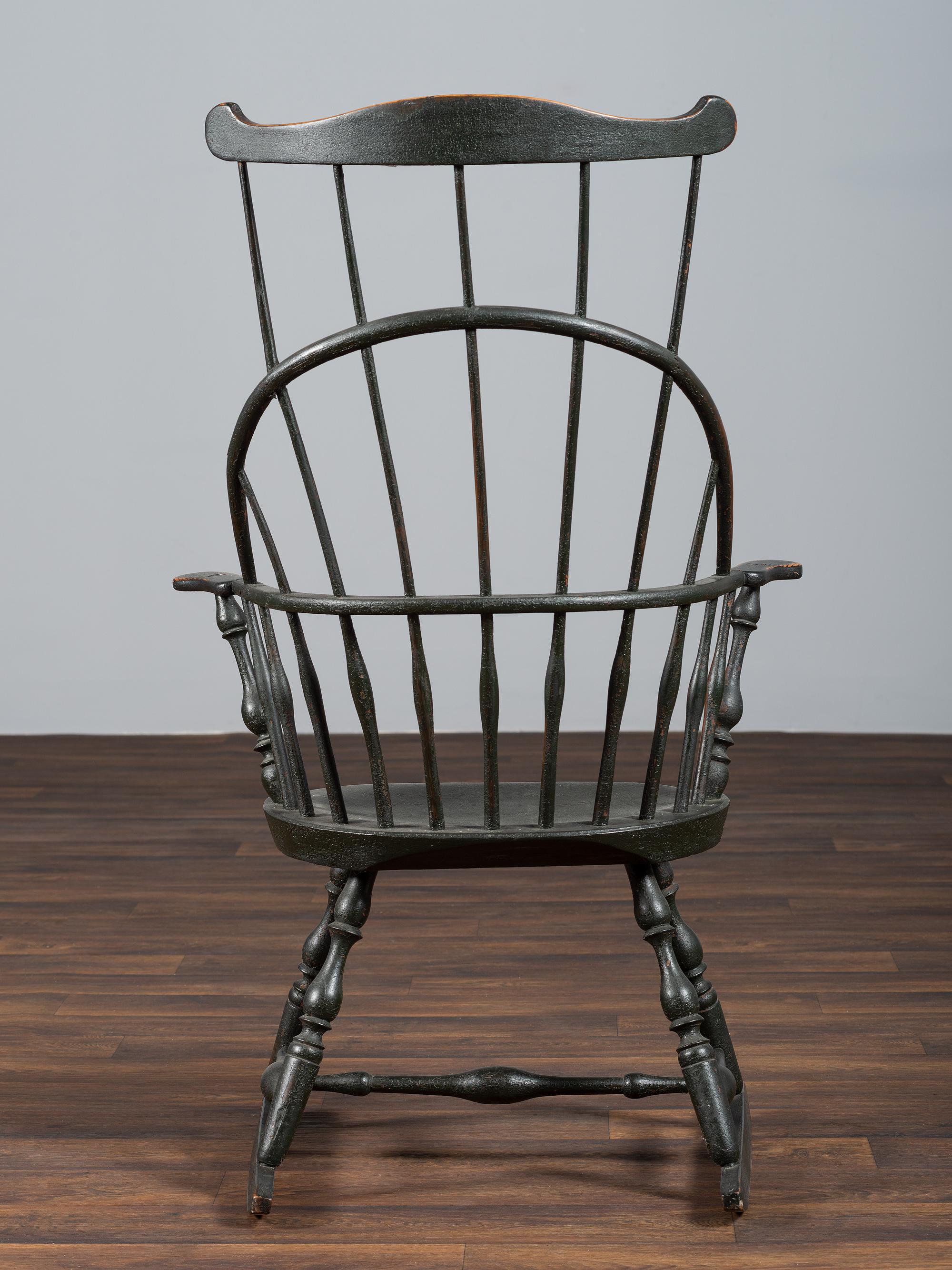 A Green-Painted Sack and Comb-Back Windsor Rocker