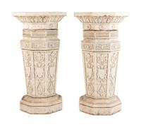 A Pair of Glazed Terra Cotta Urns and Pedestals