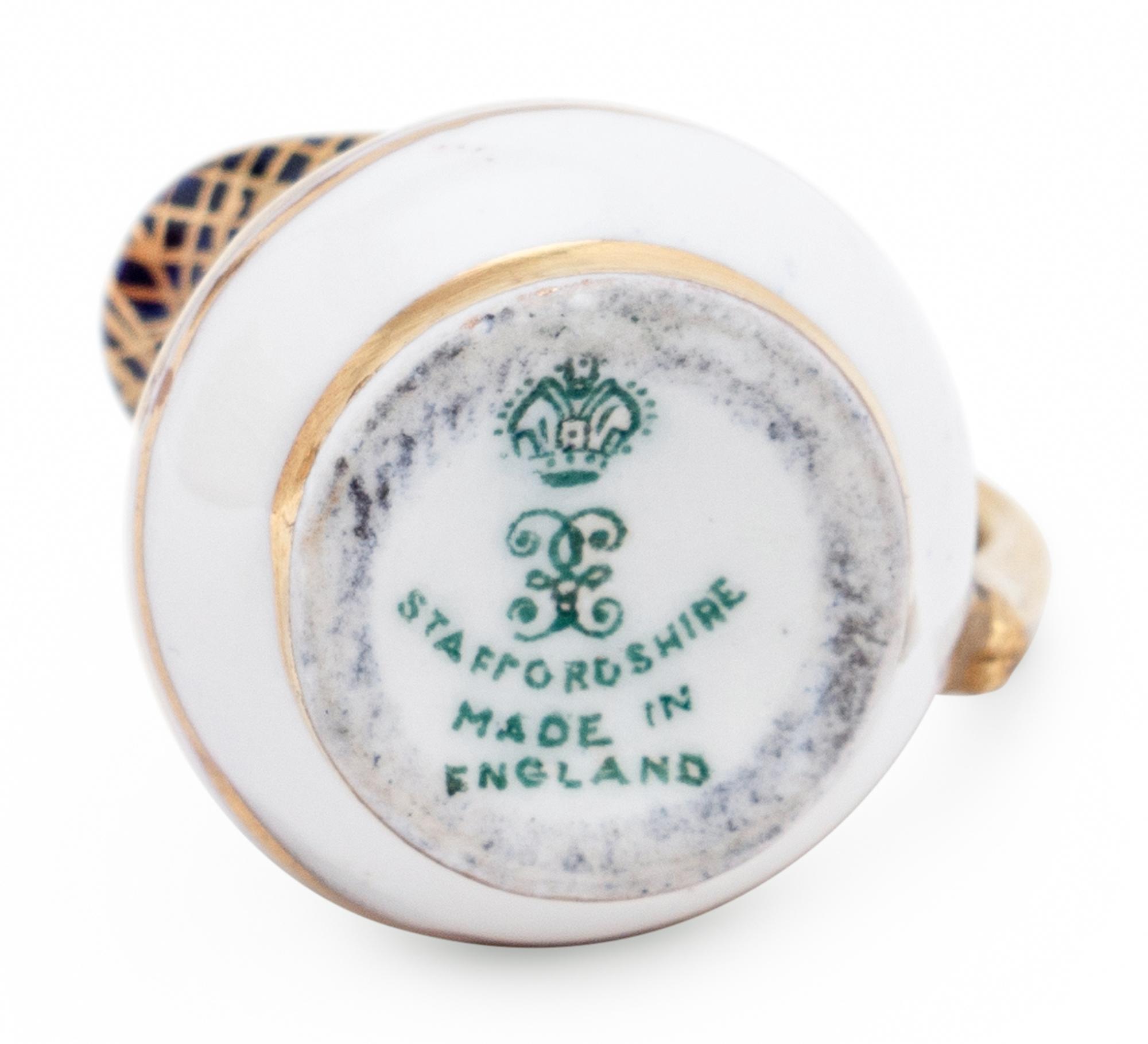 A Miniature Royal Staffordshire Porcelain Seven-Piece Coffee Service