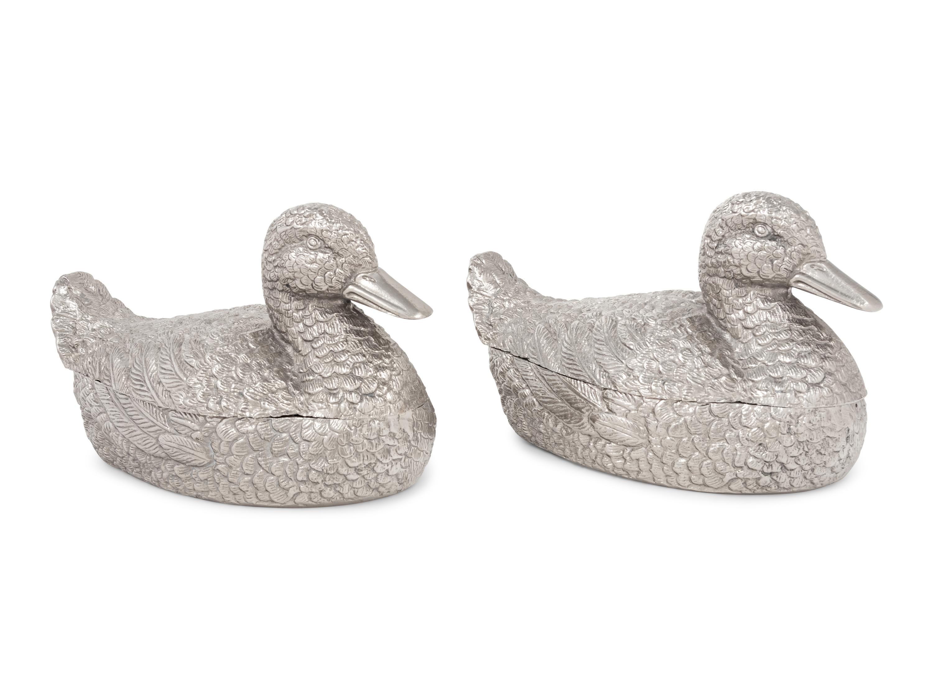 A Pair of Silvered Metal Duck-Form Boxes