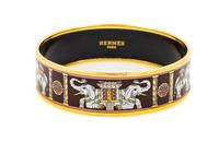 An Hermès Brown Enamel 70mm Bangle, 7cm diameter, .75" W.