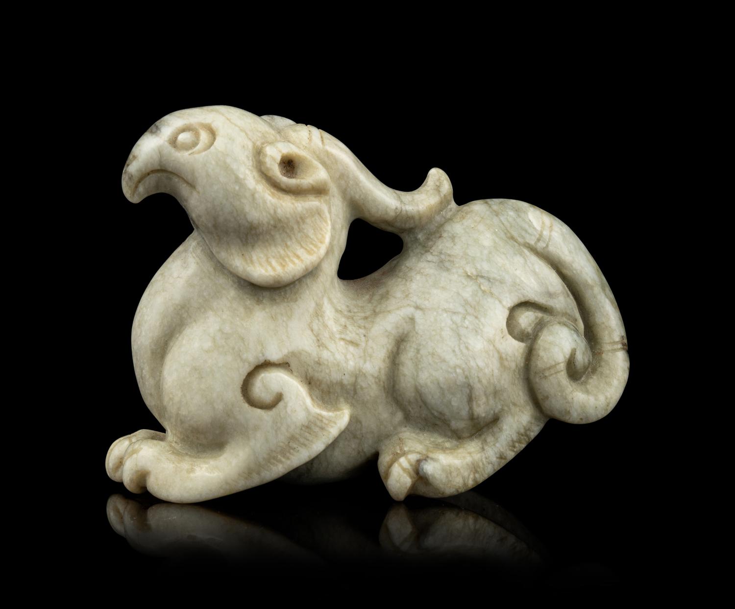 A Chinese Chicken Bone Jade Mythical Beast