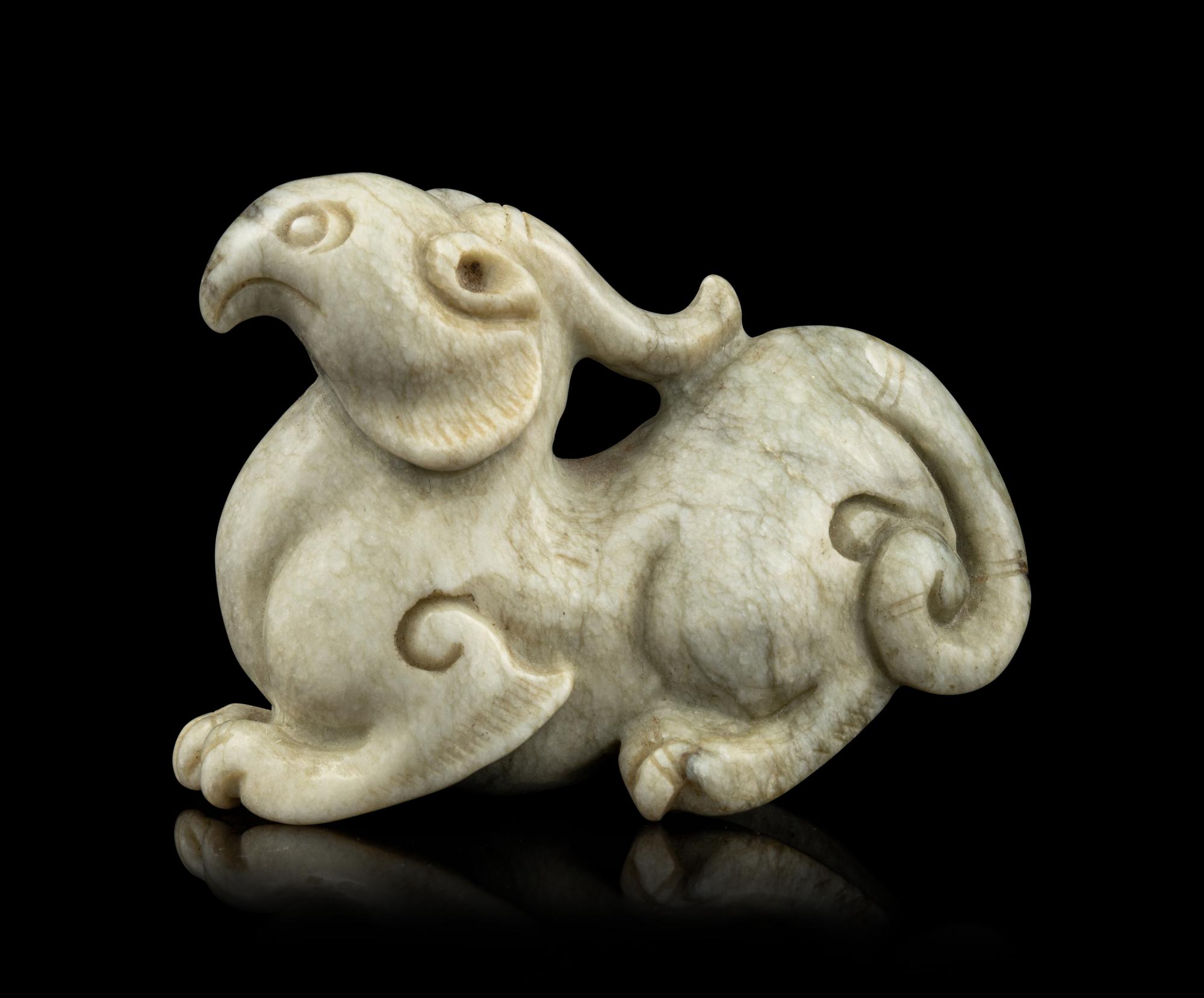 A Chinese Chicken Bone Jade Mythical Beast