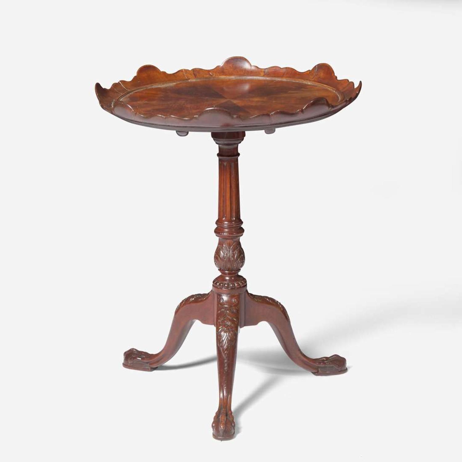 A George III carved mahogany tilt-top candlestand circa 1760