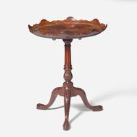 A George III carved mahogany tilt-top candlestand circa 1760
