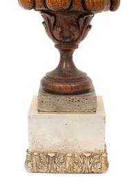 A Carved Oak Flaming Urn Finial Mounted on a Pedestal Base