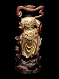 A Set of Four Gilt and Red Lacquered Wood Figures of Guardians