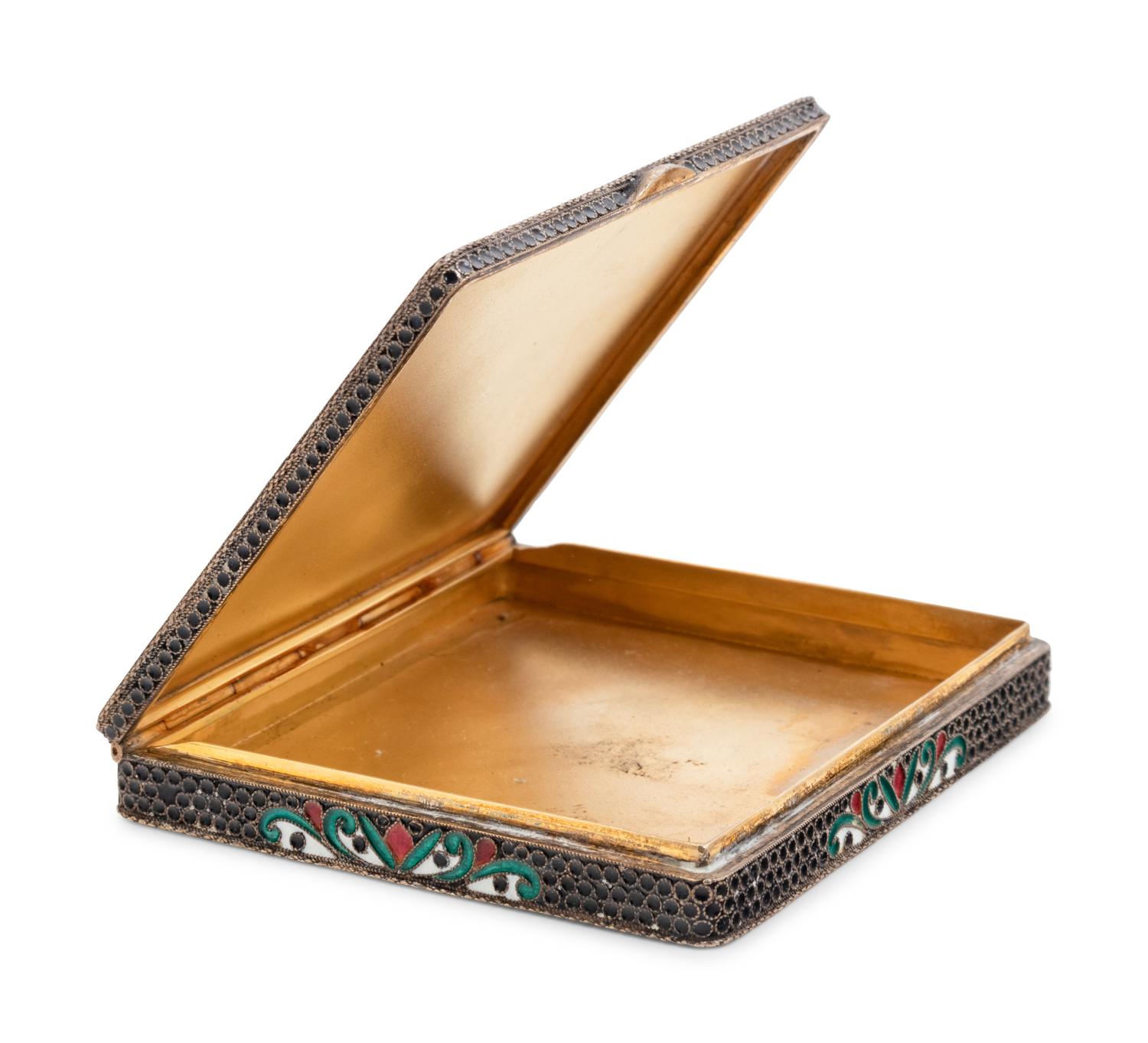 A Russian Enameled Silver and Lapis Lazuli Inset Cigarette Case