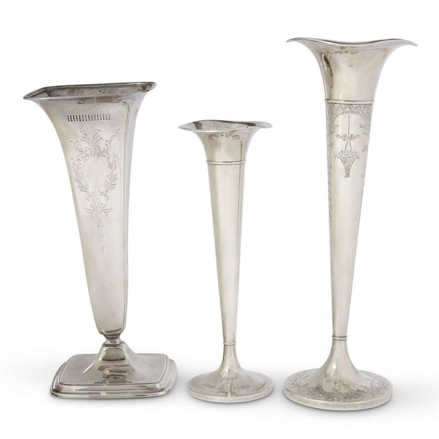 Three American sterling silver chased and engraved trumpet vases various makers, 20th century