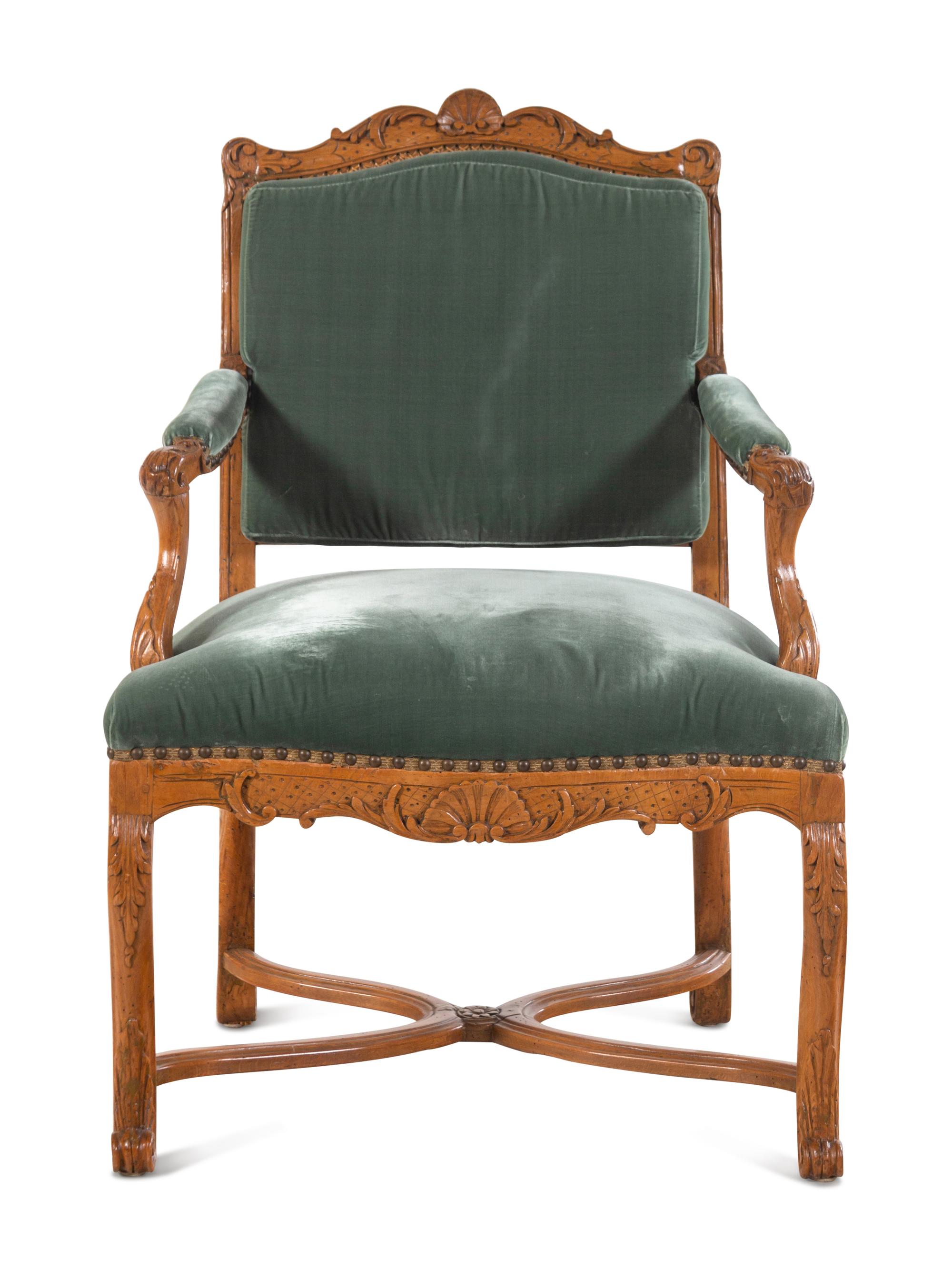 A Régence Style Velvet-Upholstered Beechwood Fauteuil