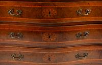 An Italian Walnut and Marquetry Marble-Top Commode