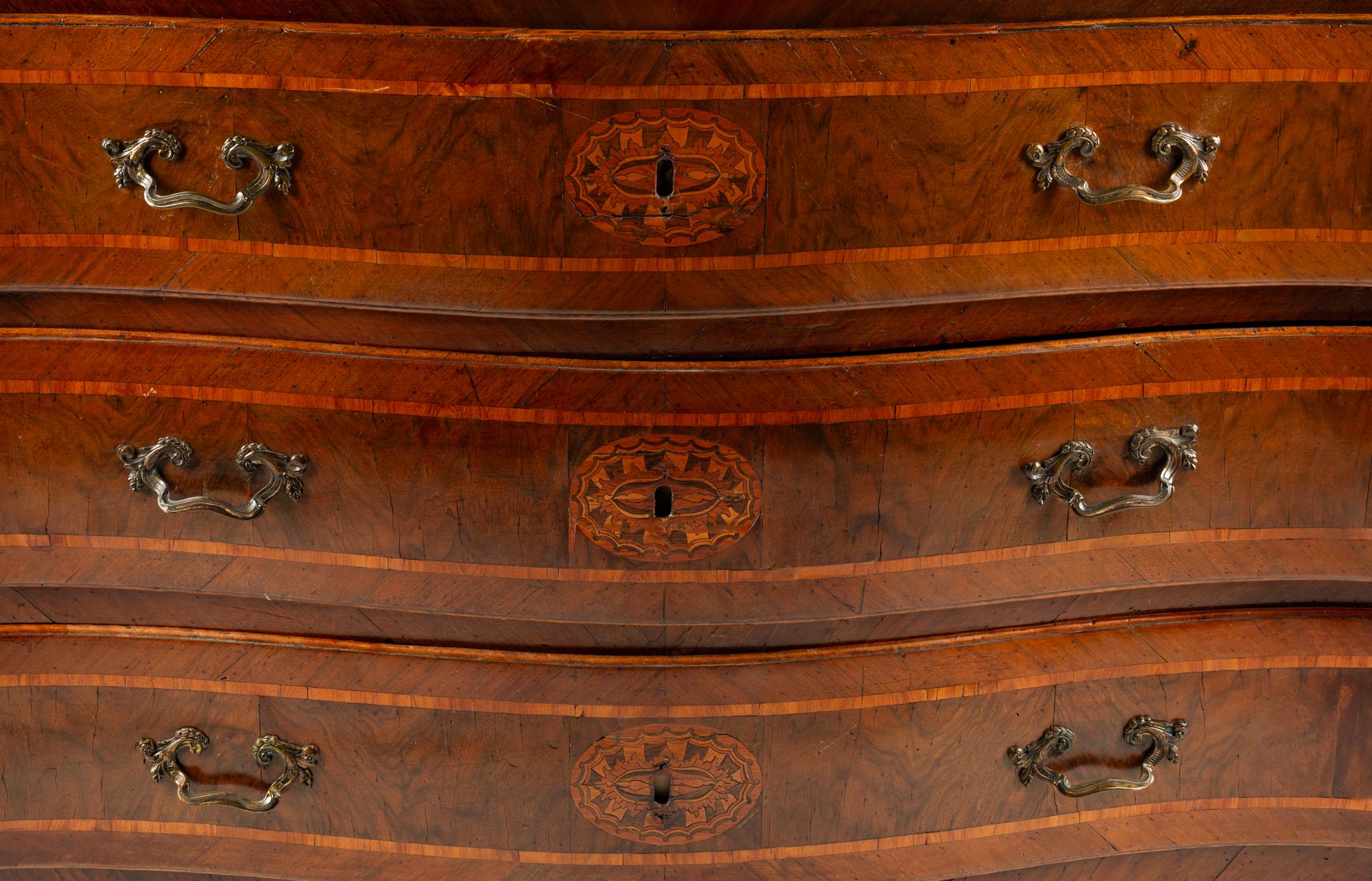 An Italian Walnut and Marquetry Marble-Top Commode