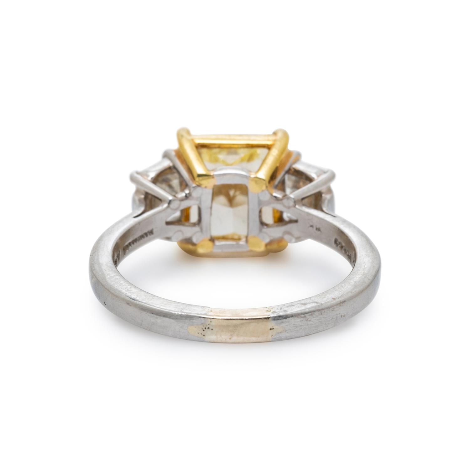 FANCY YELLOW DIAMOND AND DIAMOND RING