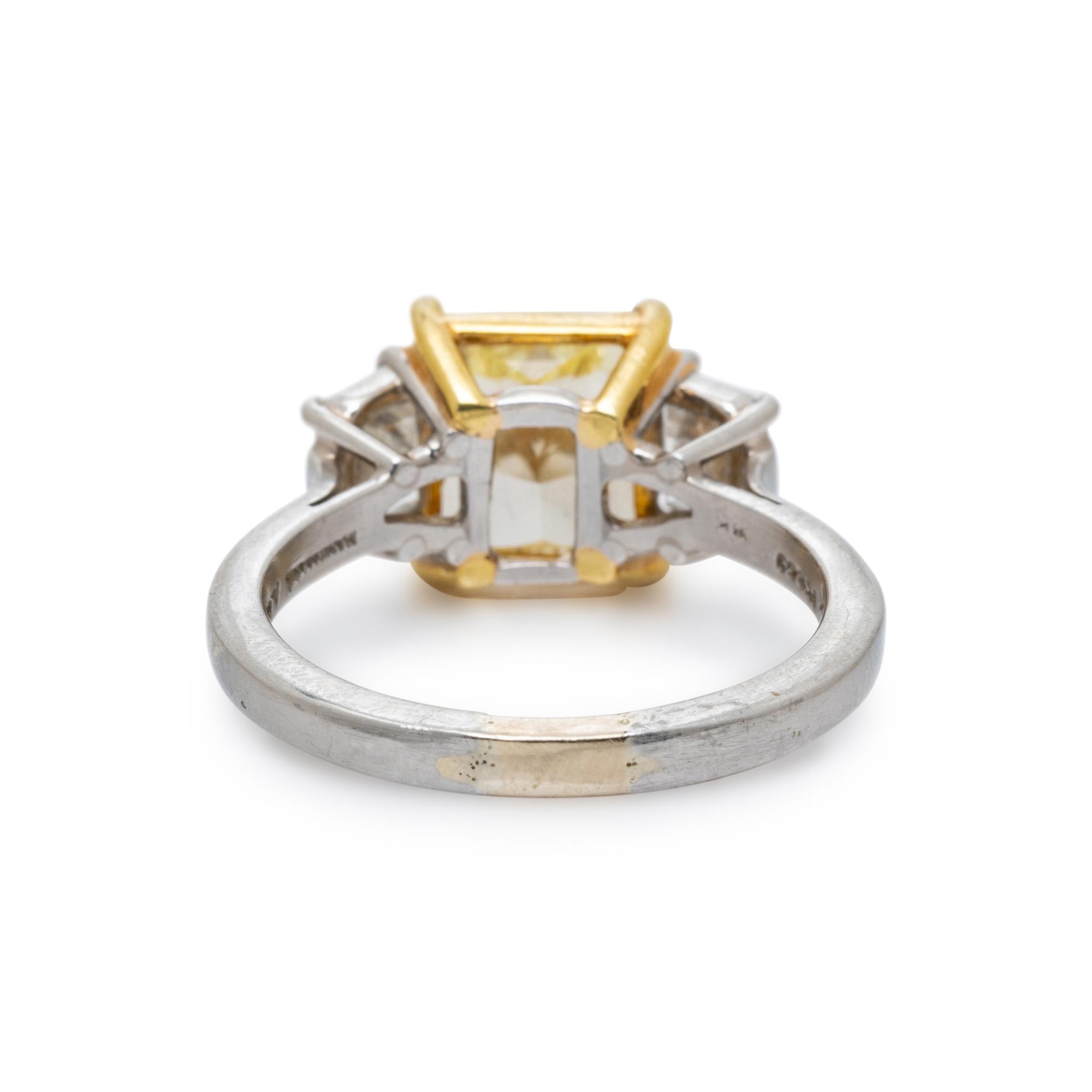 FANCY YELLOW DIAMOND AND DIAMOND RING