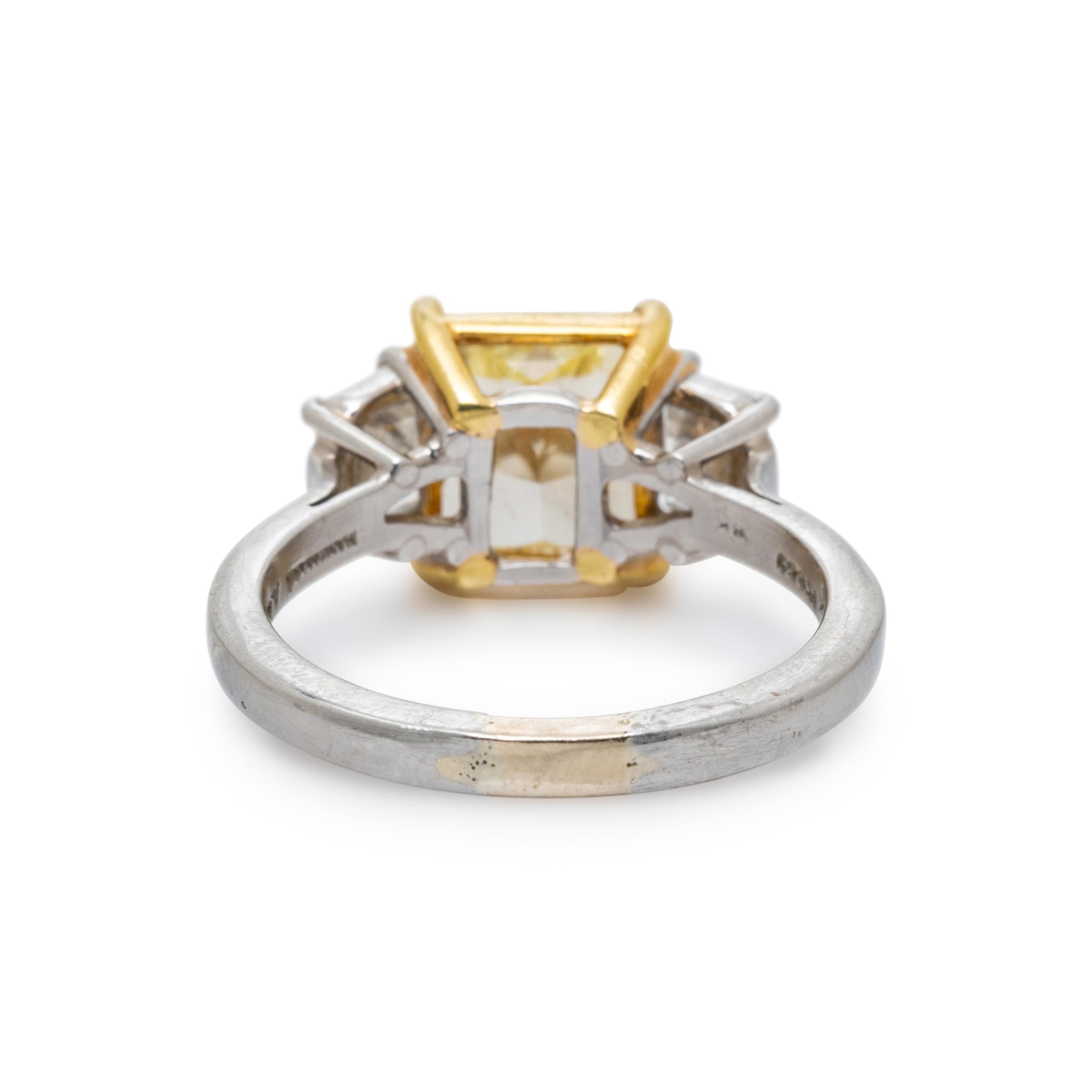 FANCY YELLOW DIAMOND AND DIAMOND RING