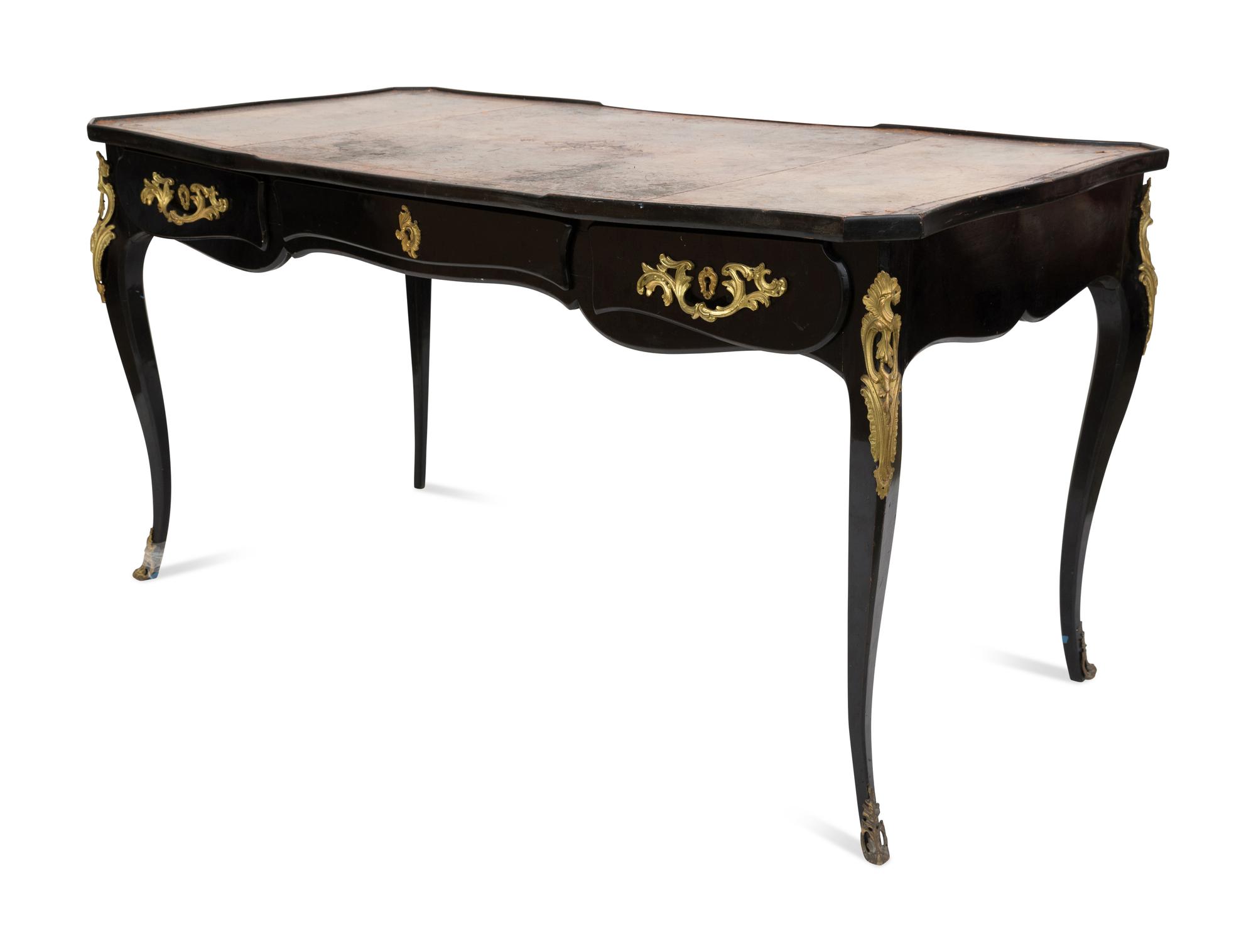 A Louis XV Style Gilt Bronze Mounted Ebonized Bureau Plat