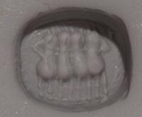 An Etruscan Carnelian Scarab with a Quadriga