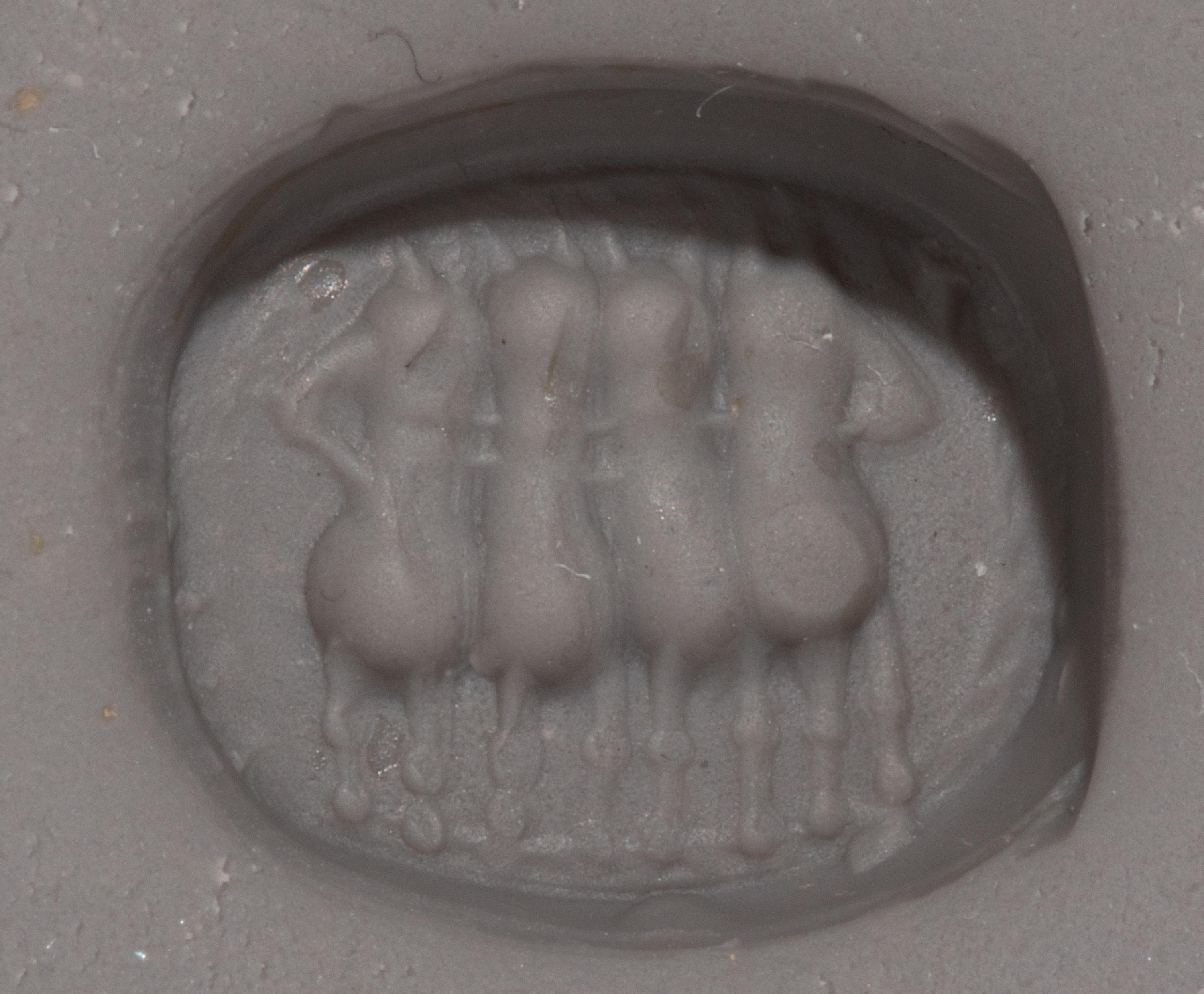 An Etruscan Carnelian Scarab with a Quadriga