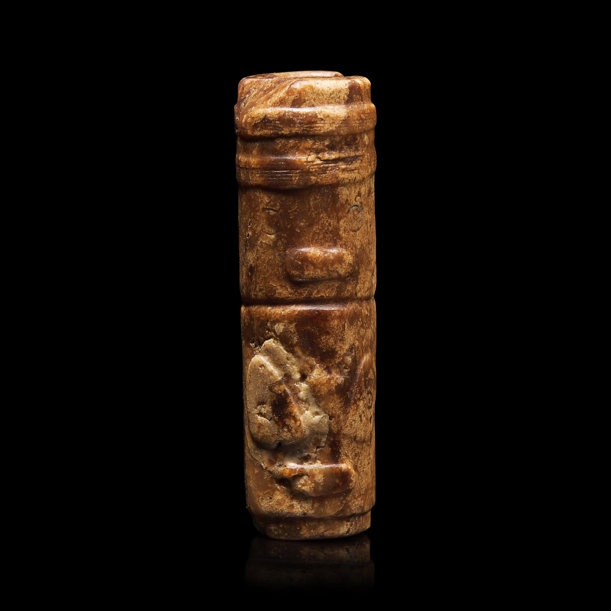 An Archaic Chinese Jade Pendant with Mask, Liangzhu Culture, and a Jade Jue, Western Zhou 良渚文化神人獸面紋玉勒及西周玉玨各一