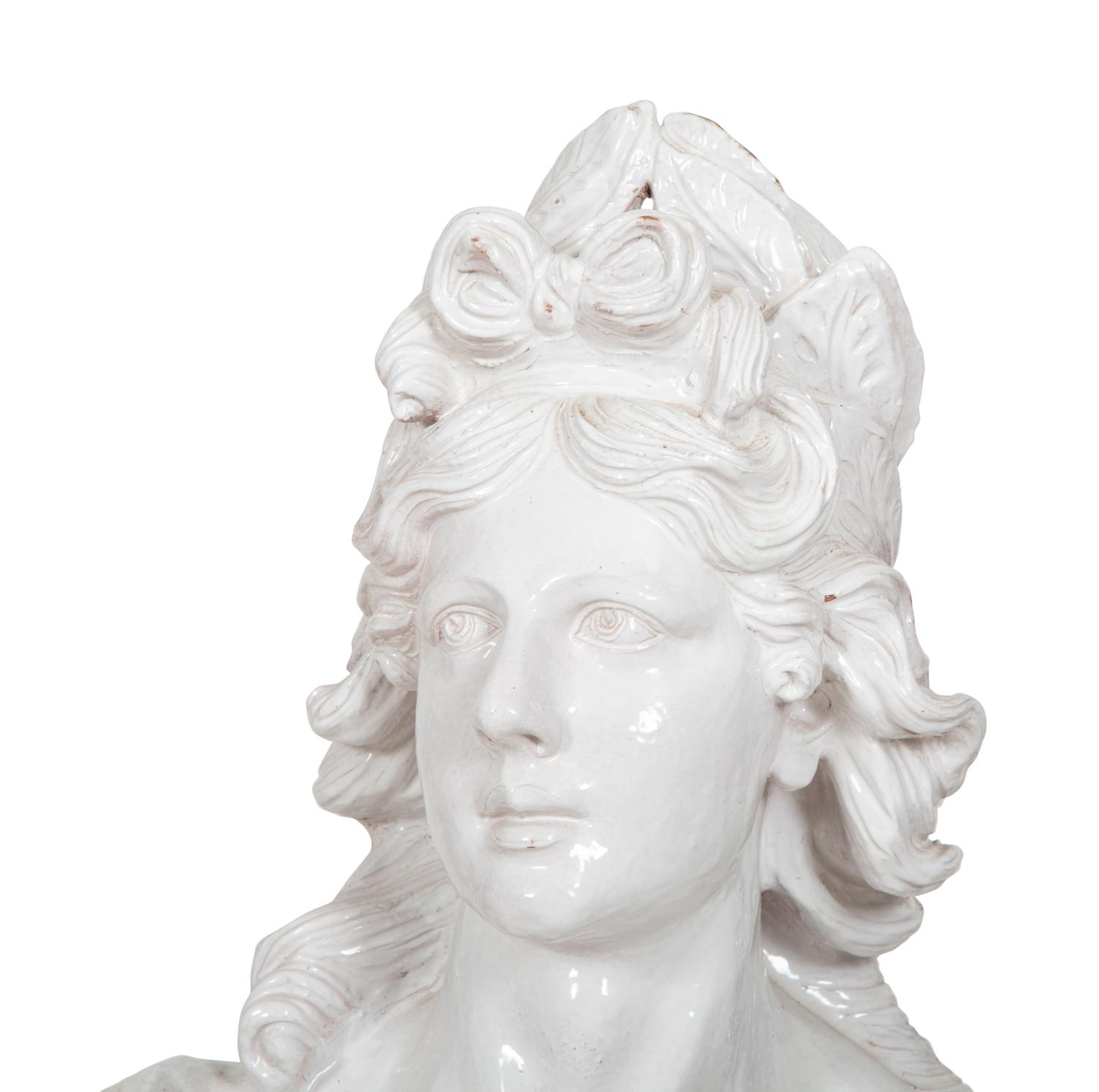 A Pair of Italian Glazed Terracotta Portrait Busts on Neoclassical Style Pedestals