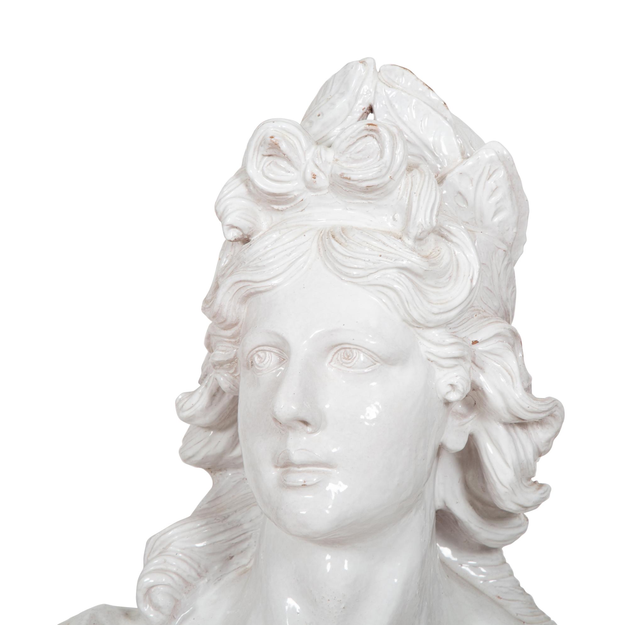 A Pair of Italian Glazed Terracotta Portrait Busts on Neoclassical Style Pedestals