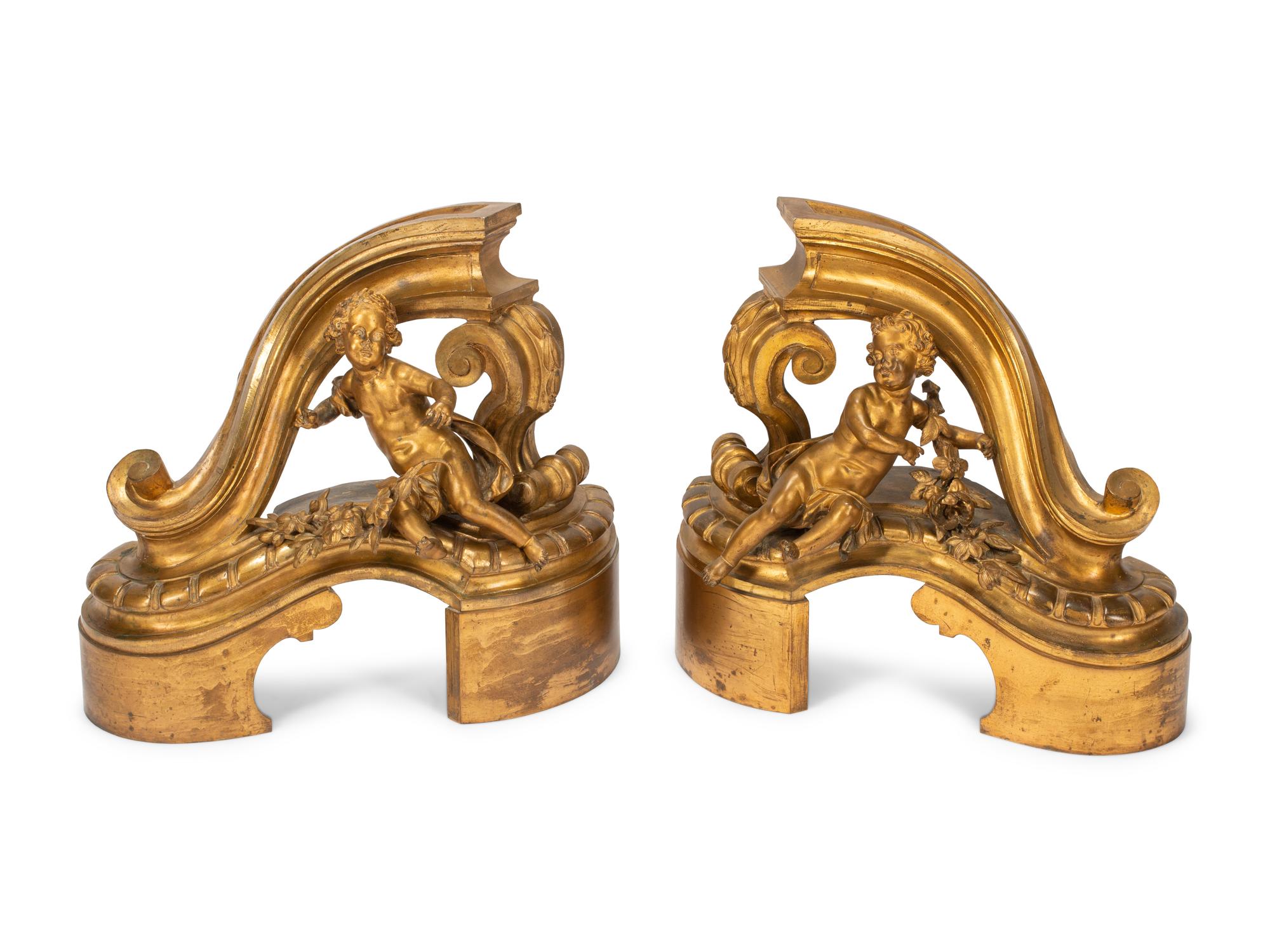 A Pair of Large Louis XV Style Gilt Bronze Figural Chenets