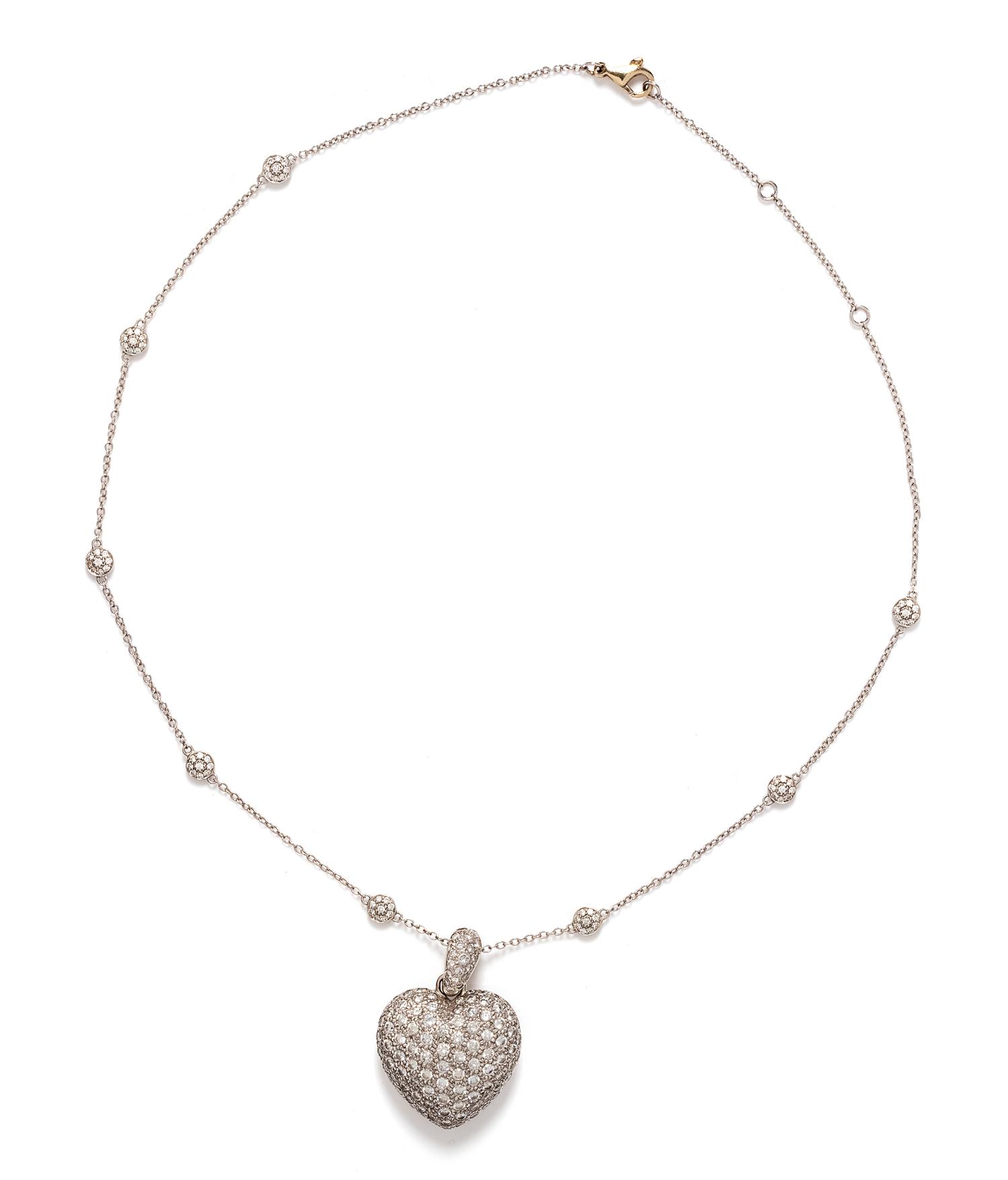 A White Gold and Diamond Heart Pendant/Necklace,