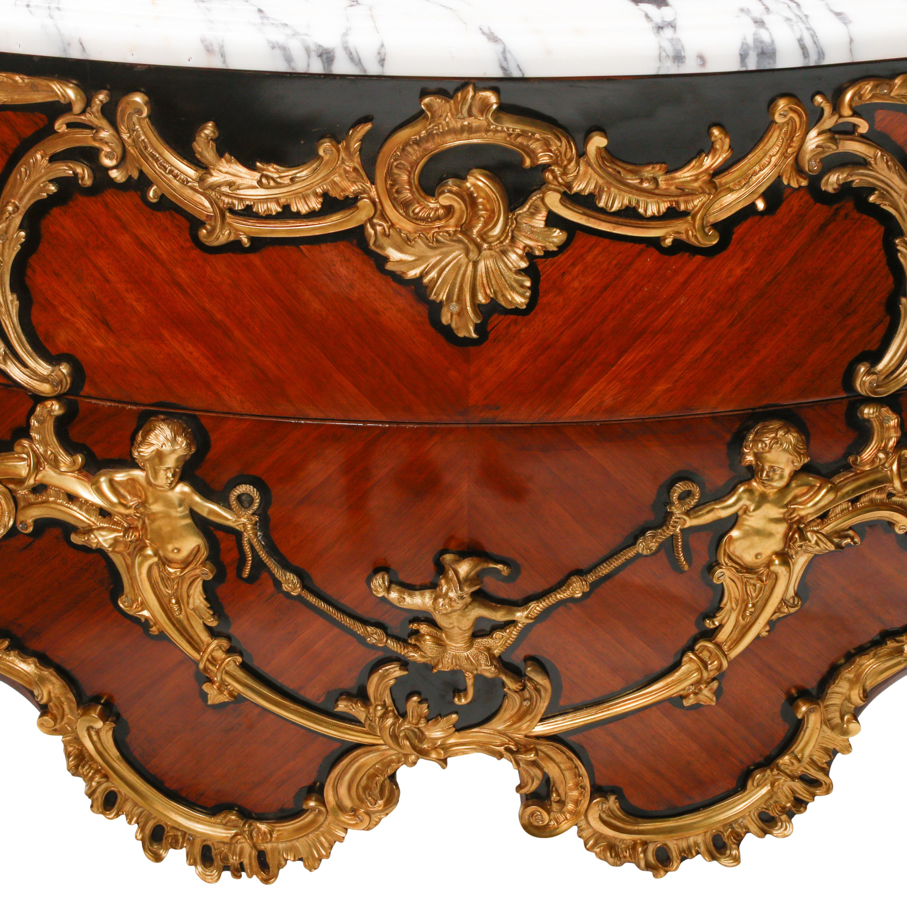 A Pair of Louis XV Style Gilt Bronze Mounted Marble-Top Commodes