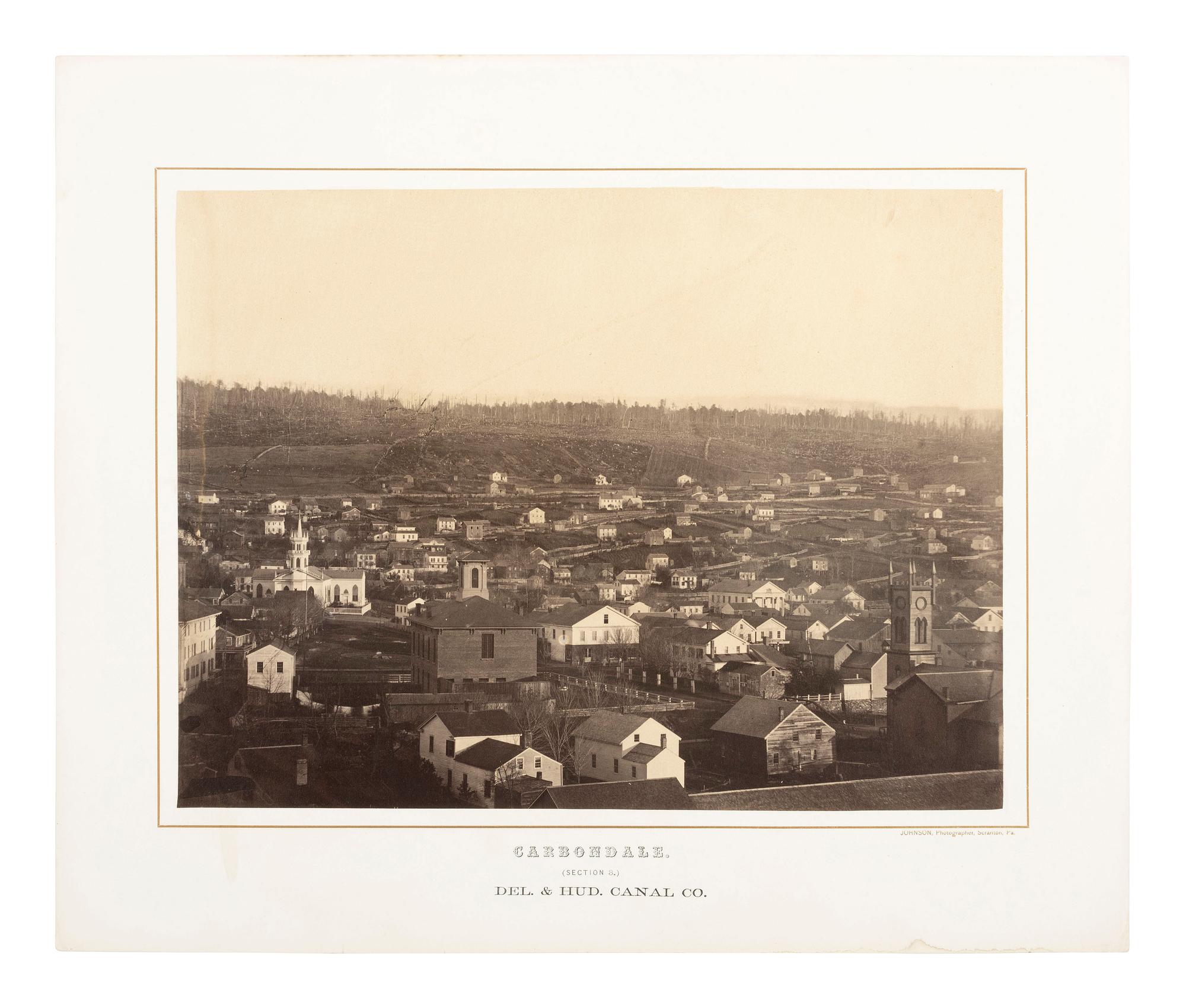 Pennsylvania JOHNSON, Thomas H. (b. 1821), photographer. Exceptional 3-section panoramic view of Carbondale, PA. Ca 1863-1865.