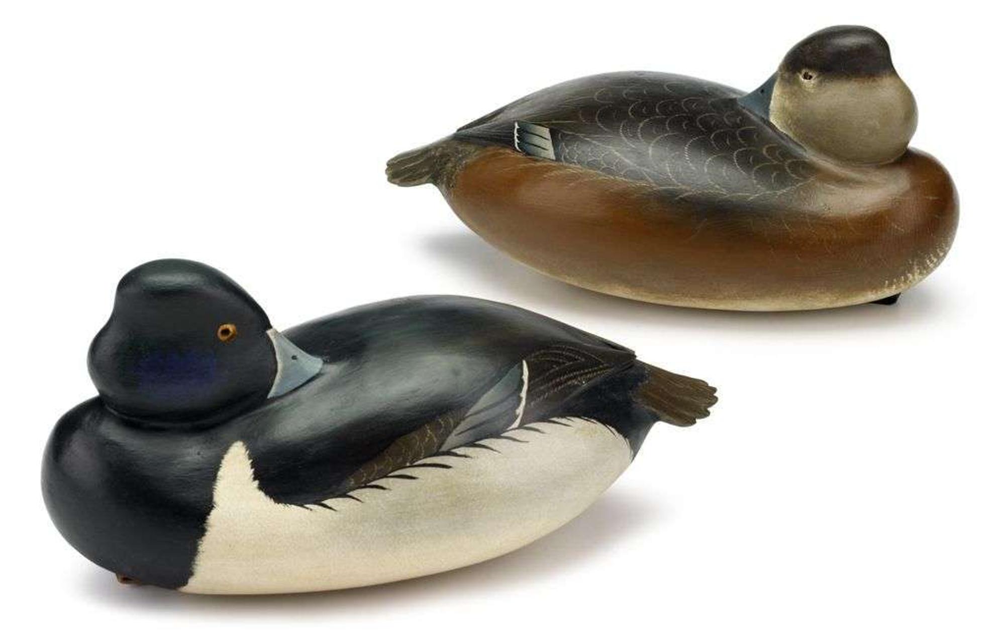 Pair of carved and painted ringbill decoy Sleepers robert white (b. 1939), tullytown, pa