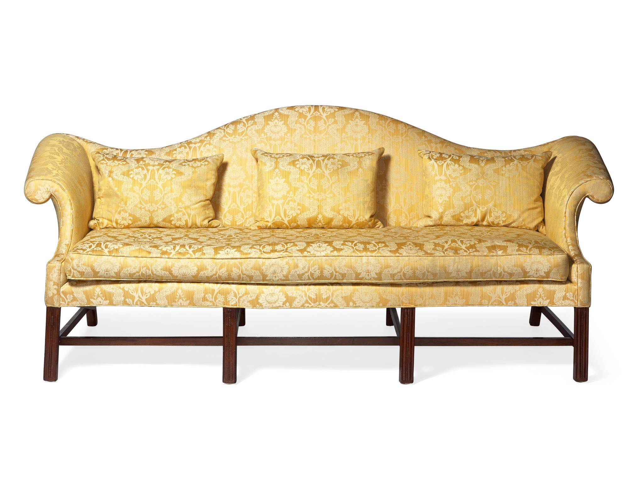 A Chippendale Mahogany Eight-Leg Camelback Sofa