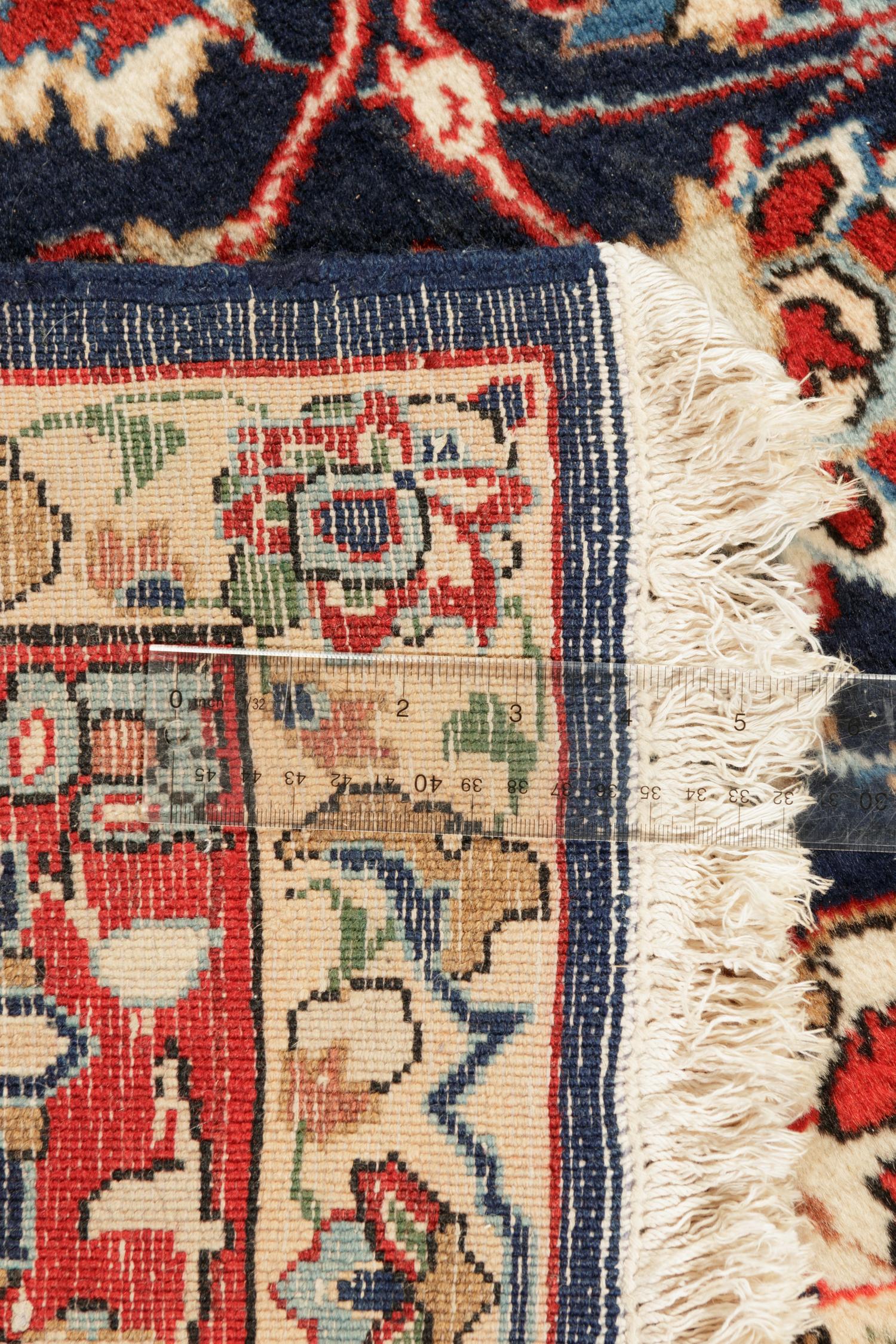 A Kashan Wool Rug