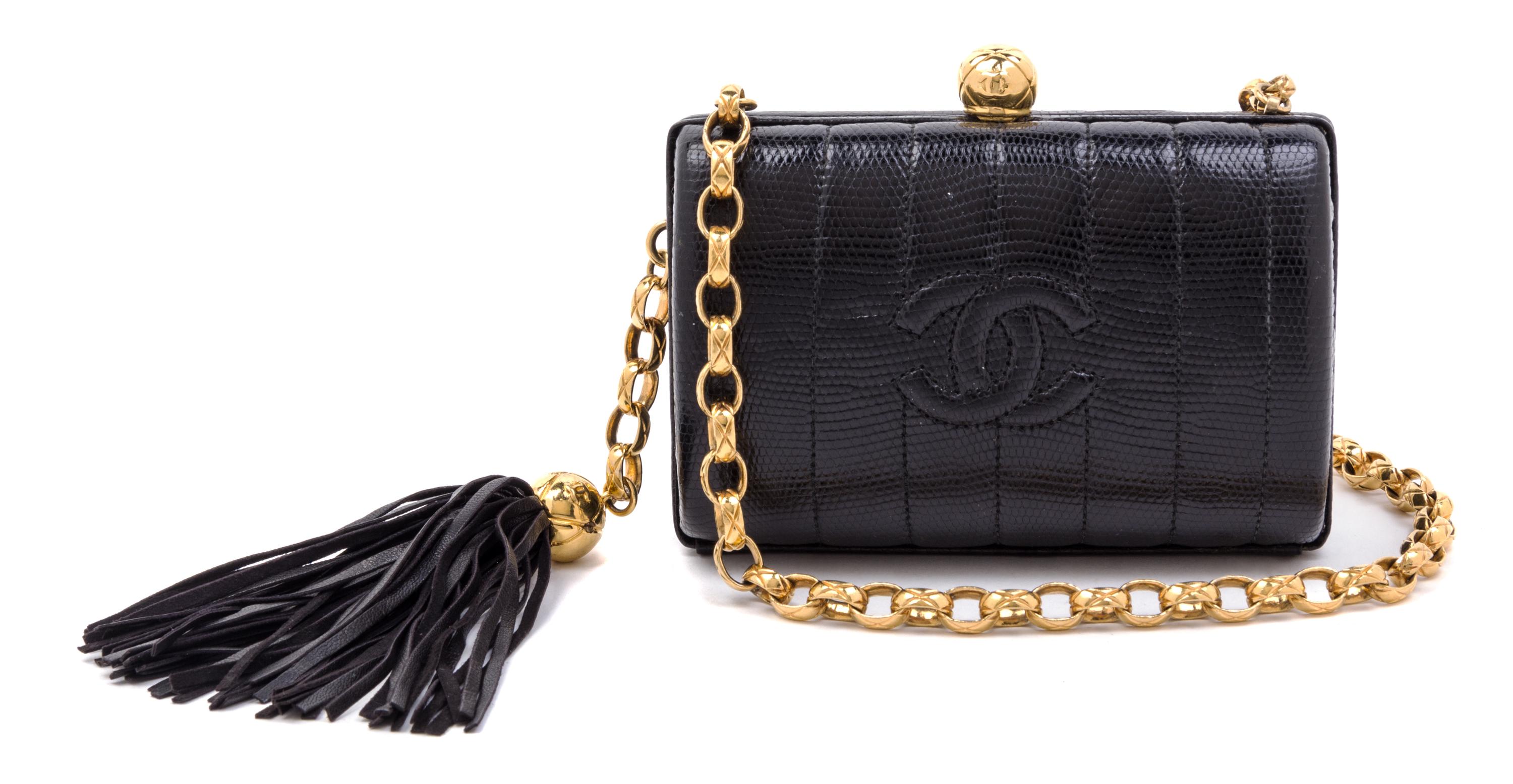 A Chanel Black Embossed Leather Evening Bag, 5.5" x 4" x 2.5".