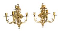 A Pair of Neoclassical Brass Four-Light Sconces Height 16 inches.