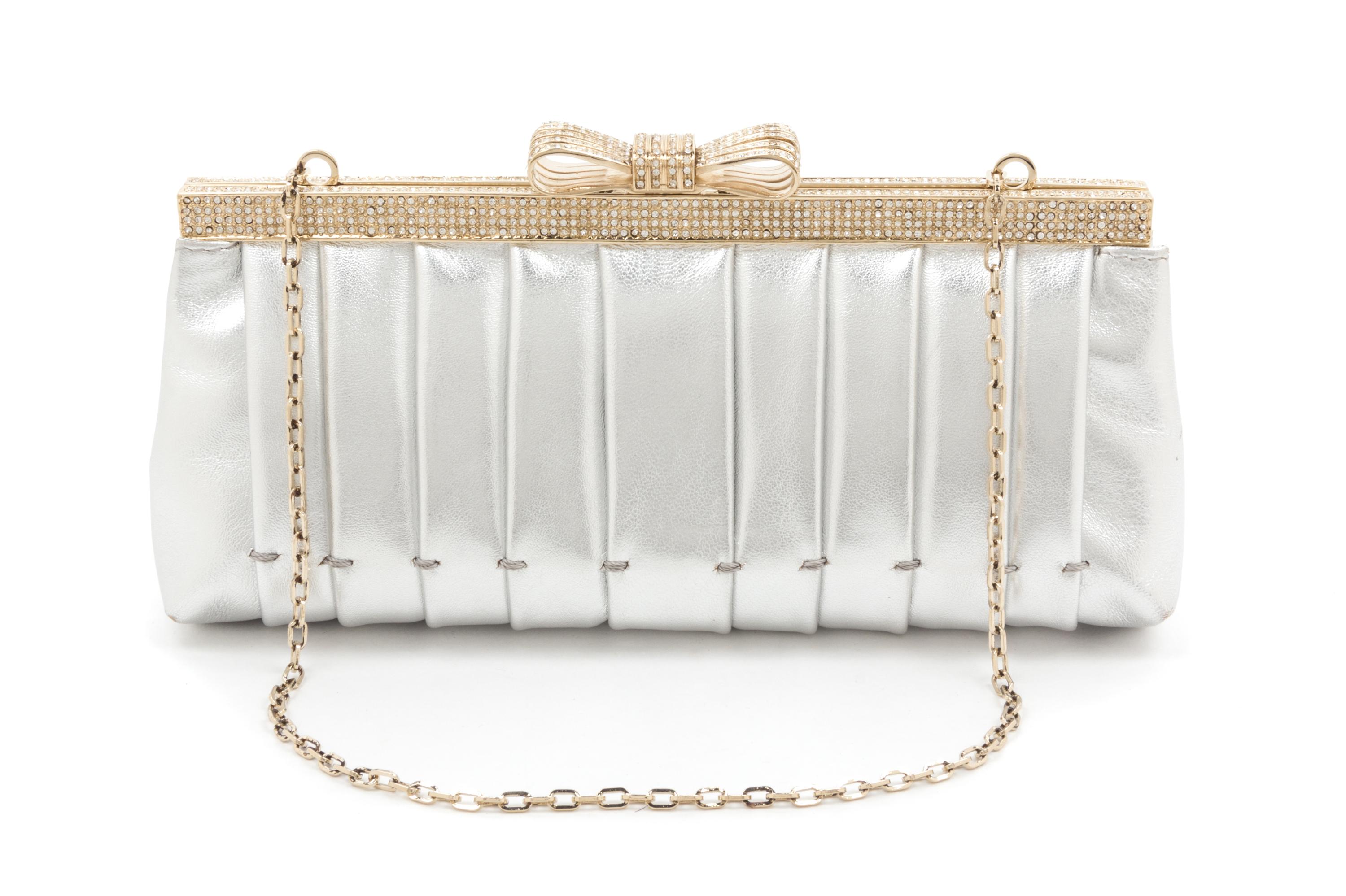 A Valentino Silver Metallic Leather Clutch, 9.5" x 4" x 2".