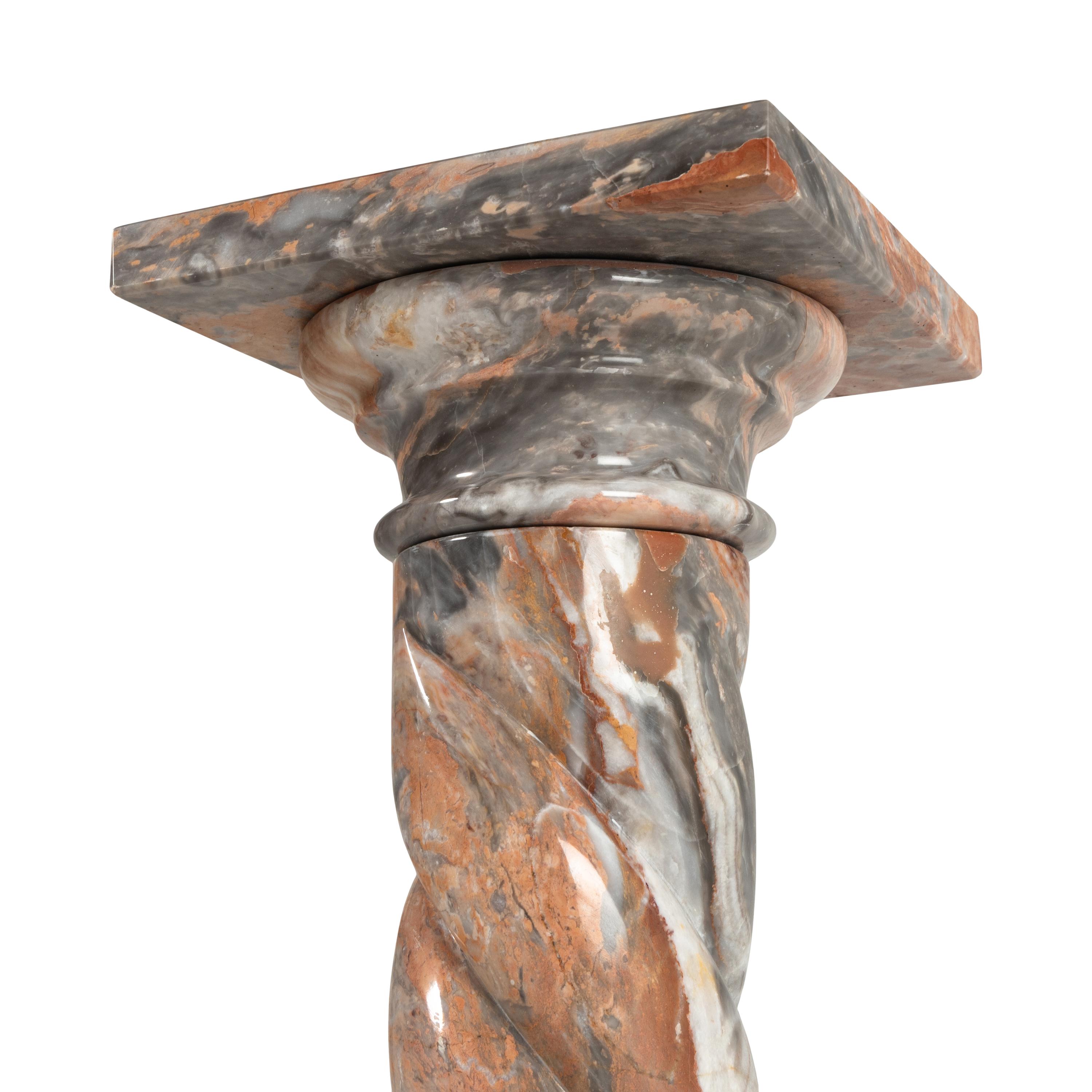 A Pair of Twist-Carved Marble Pedestals