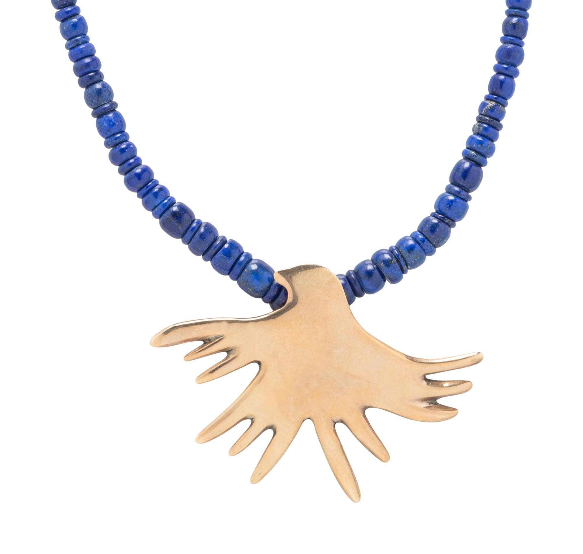 YELLOW GOLD THUNDERBIRD AND LAPIS LAZULI BEAD NECKLACE